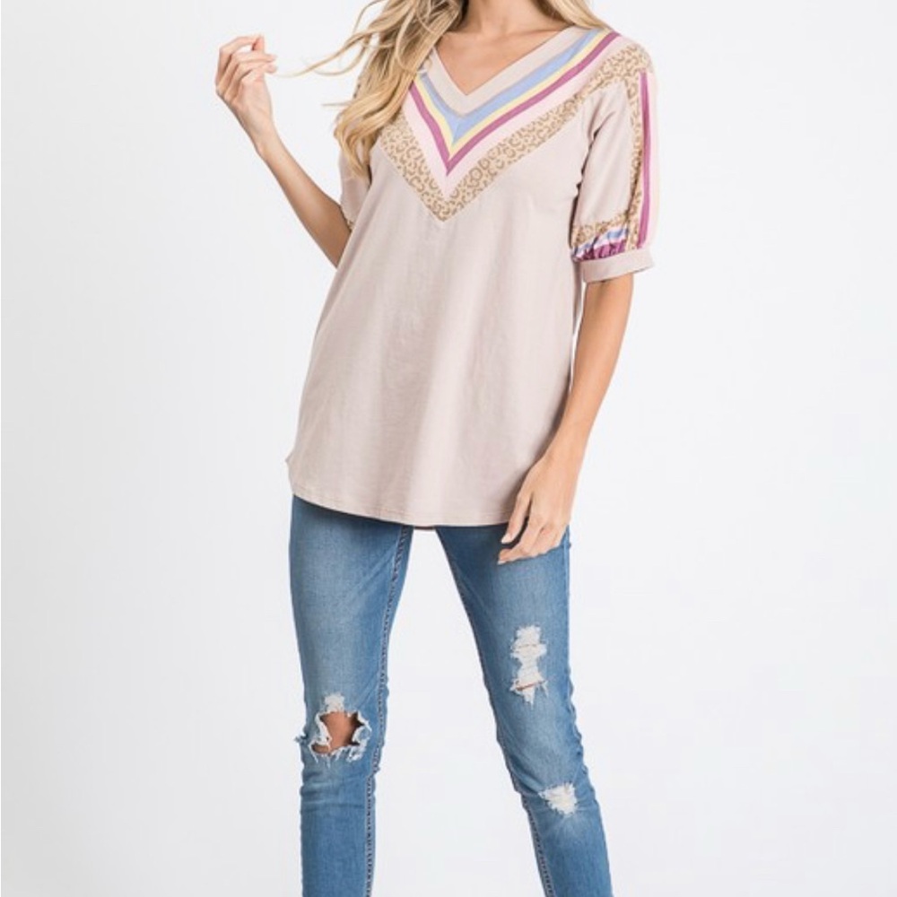 Woman’s rainbow leopard top